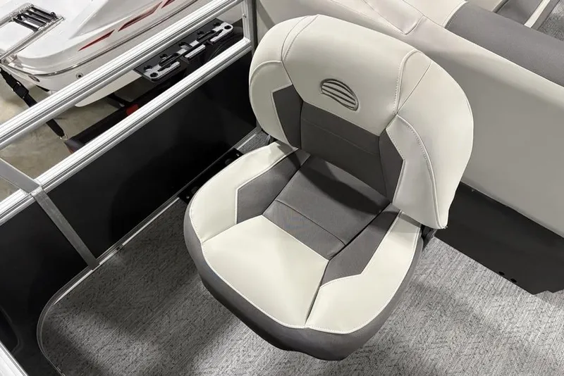 Slide: The Image of 2026 Sun Tracker Bass Buggy 18 DLX boat seat, featuring gray and white upholstery. - 20