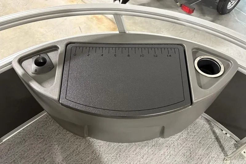 Slide: The Image of 2026 Sun Tracker Bass Buggy 18 DLX console with ruler and cup holder. - 7