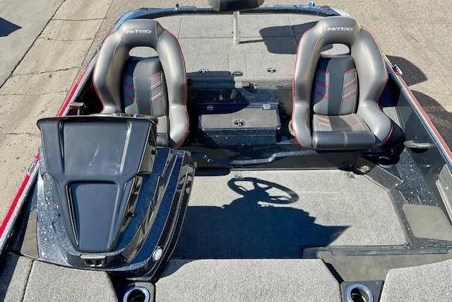 Slide: The Image of 2024 Nitro Z20 Pro boat interior with dual seats and steering console. - 10