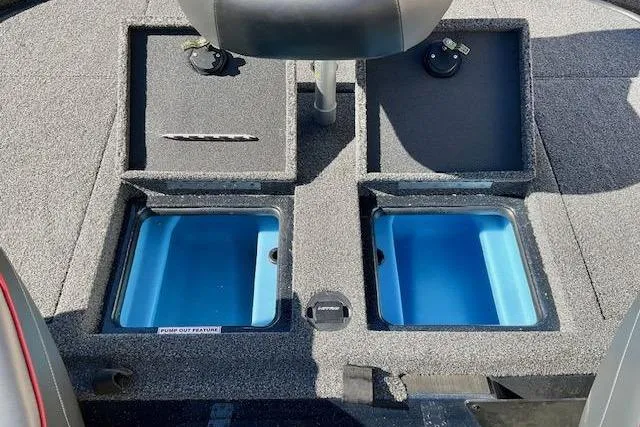 Slide: The Image of 2024 Nitro Z20 Pro boat interior with dual livewells and storage compartments. - 16