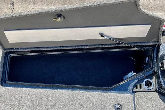 Slide: The Image of Open storage compartment in 2024 Nitro Z20 Pro boat. - 20