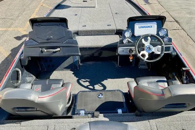 Slide: The Image of 2024 Nitro Z20 Pro boat interior with dual seats, steering wheel, and Lowrance electronics. - 24