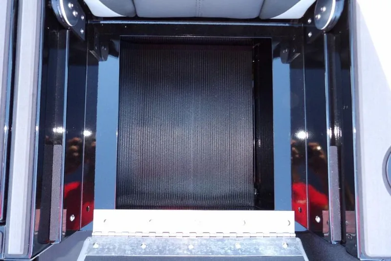 Slide: The Image of Interior view of 2026 Lund 1975 Renegade boat compartment, featuring sleek black finish. - 15