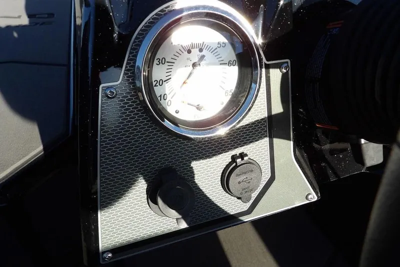 Slide: The Image of Dashboard of 2026 Lund 1975 Renegade boat with gauge and controls. - 17