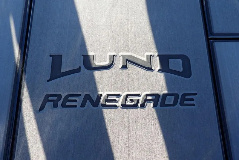 Slide: The Image of Close-up of Lund 1975 Renegade logo on metallic surface, 2026 model. - 39