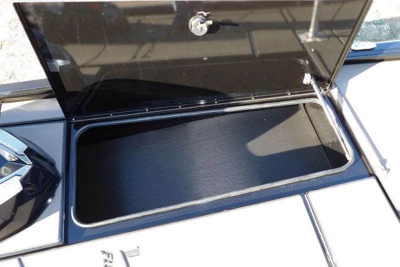 Slide: The Image of Open storage compartment on 2026 Lund 1975 Renegade boat. - 41