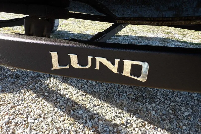 Slide: The Image of Lund 1975 Renegade 2026 model logo on a boat trailer frame. - 45