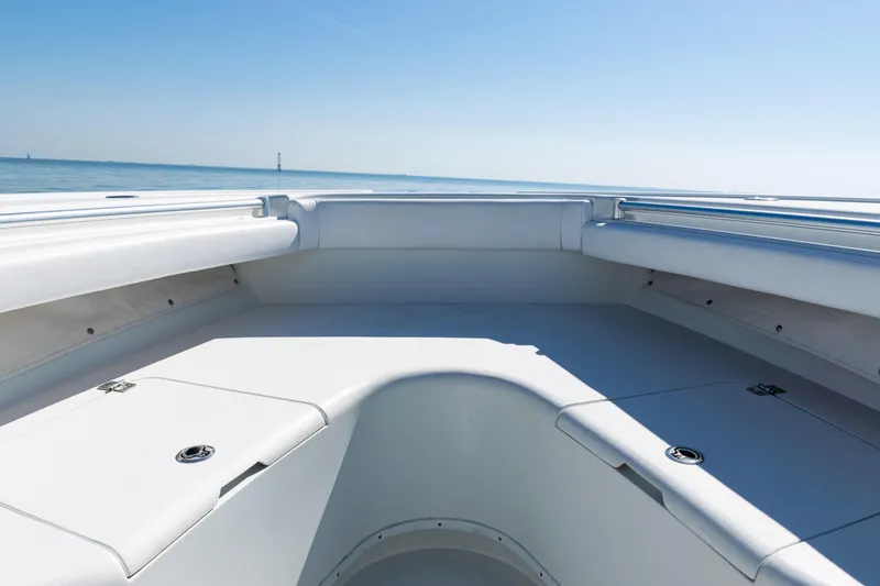 Slide: The Image of 2014 Yellowfin 36 Offshore boat deck with ocean view under clear blue sky. - 20