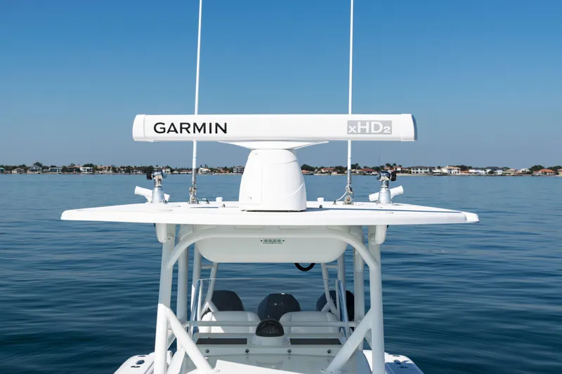 Slide: The Image of 2014 Yellowfin 36 Offshore boat with Garmin xHD2 radar on calm water. - 22