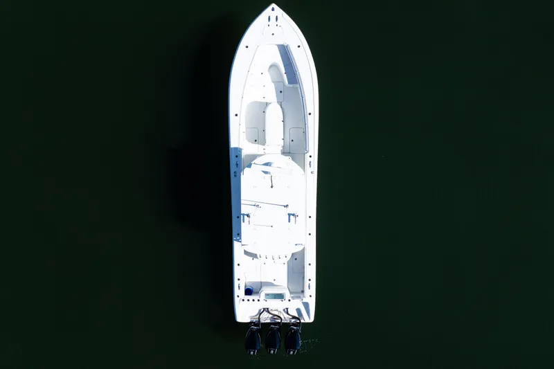 Slide: The Image of Aerial view of 2014 Yellowfin 36 Offshore boat on dark water. - 45