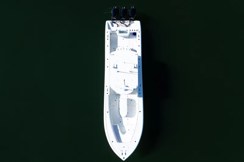 Slide: The Image of Overhead view of 2014 Yellowfin 36 Offshore boat on dark water. - 46