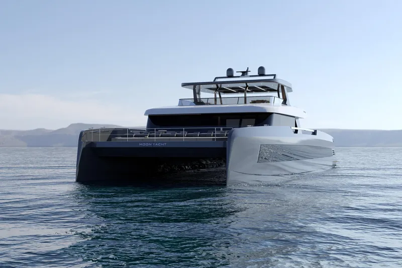 Slide: The Image of Luxury Moon 9ty yacht cruising on calm waters, 2027 model. - 20