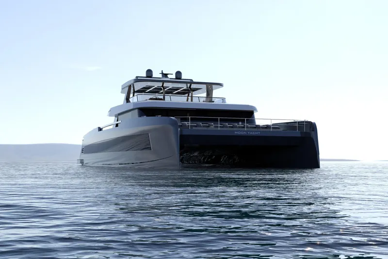 Slide: The Image of Luxurious 2027 Moon 9ty yacht on calm waters under clear sky. - 22