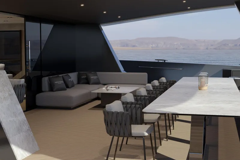 Slide: The Image of Luxurious interior of 2027 Moon 9ty yacht with elegant seating and ocean view. - 39