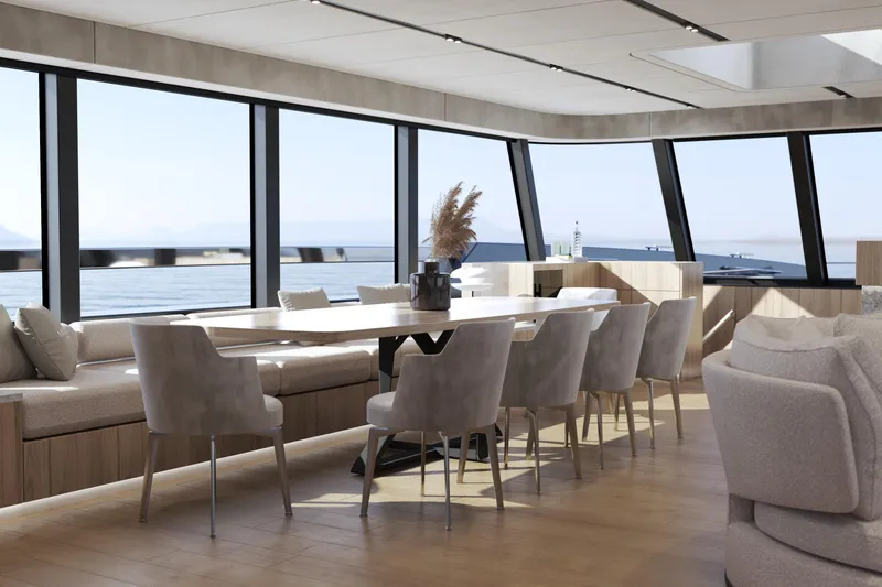 Slide: The Image of Luxurious interior of 2027 Moon 9ty yacht with panoramic ocean views and elegant dining area. - 47