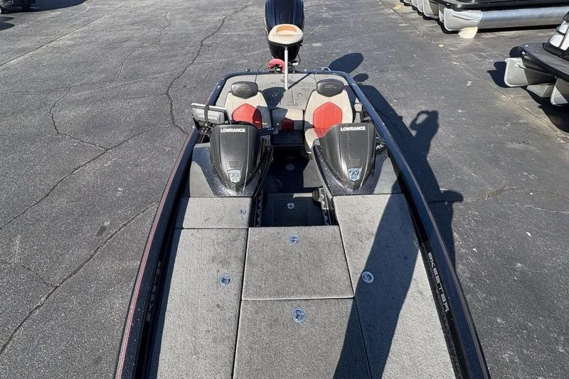 Slide: The Image of 2015 Skeeter FX20 bass boat with dual Lowrance fish finders on deck. - 27