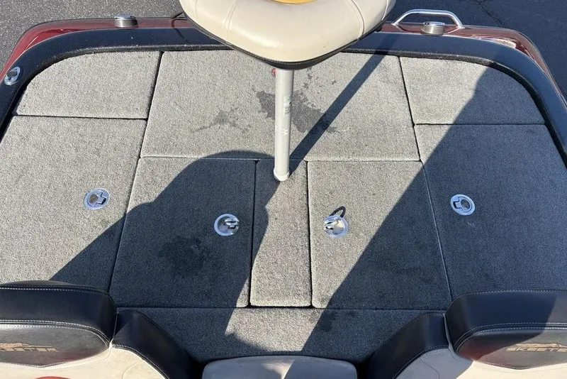 Slide: The Image of 2015 Skeeter FX20 boat deck with seating and storage compartments. - 29