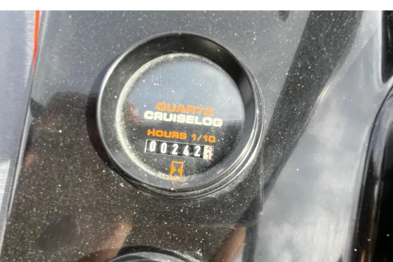 Slide: The Image of 1988 Mirage 217 Intruder quartz hour meter, displaying 242.1 hours. - 14