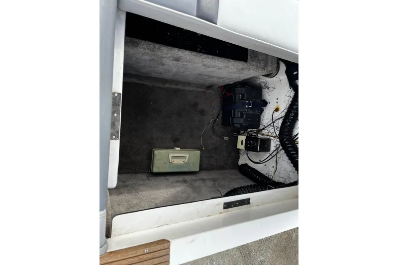 Slide: The Image of 1988 Mirage Manufacturing 217 Intruder interior compartment with wiring and equipment. - 9