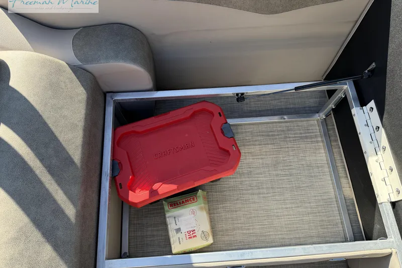 Slide: The Image of Under-seat storage in 2019 Avalon Catalina Quad Lounge with Craftsman toolbox. - 15