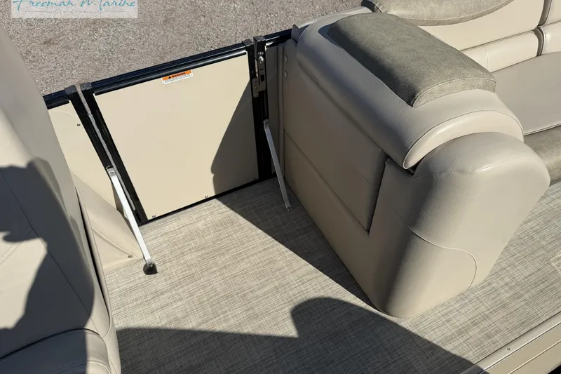 Slide: The Image of 2019 Avalon Catalina Quad Lounge interior with beige seating and flooring. - 24