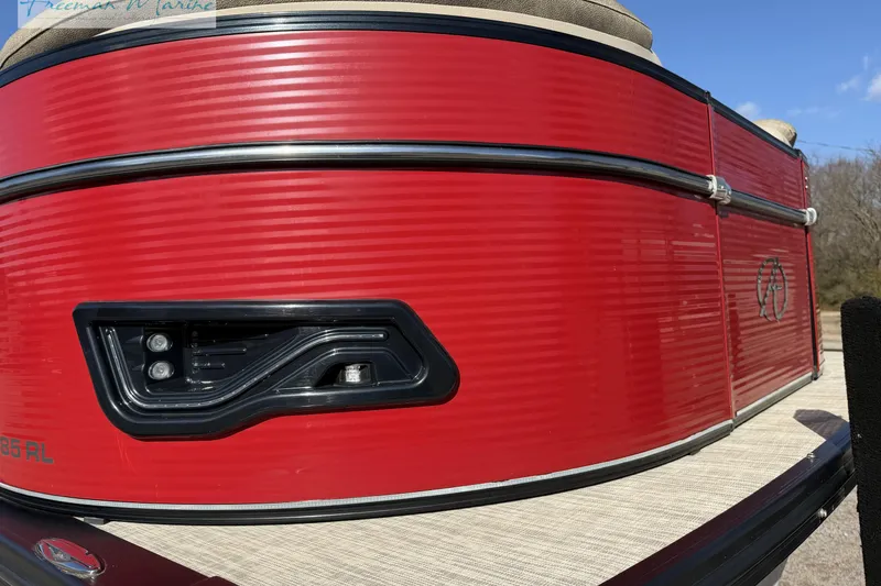 Slide: The Image of 2019 Avalon Catalina Quad Lounge 25' pontoon boat with vibrant red exterior detailing. - 3