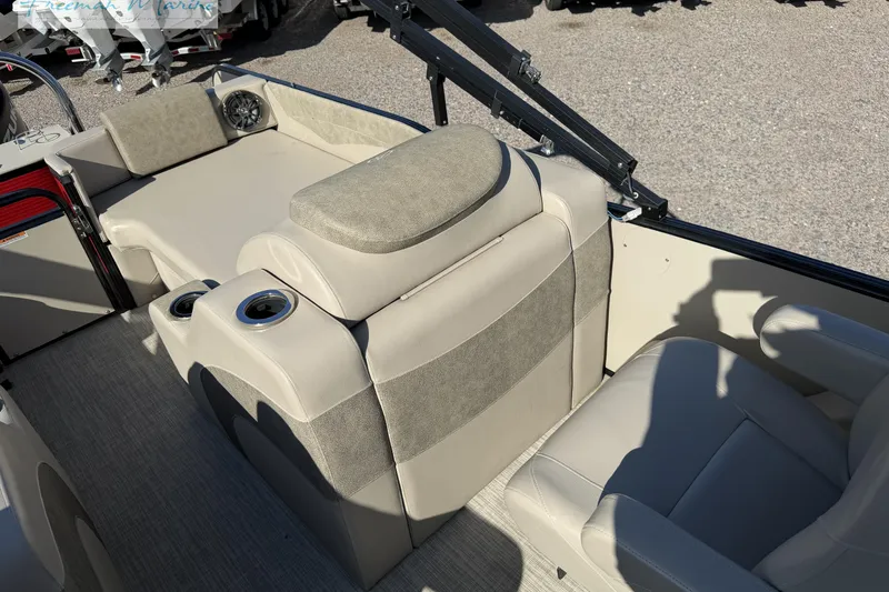 Slide: The Image of 2019 Avalon Catalina Quad Lounge interior with beige seating and cup holders. - 34