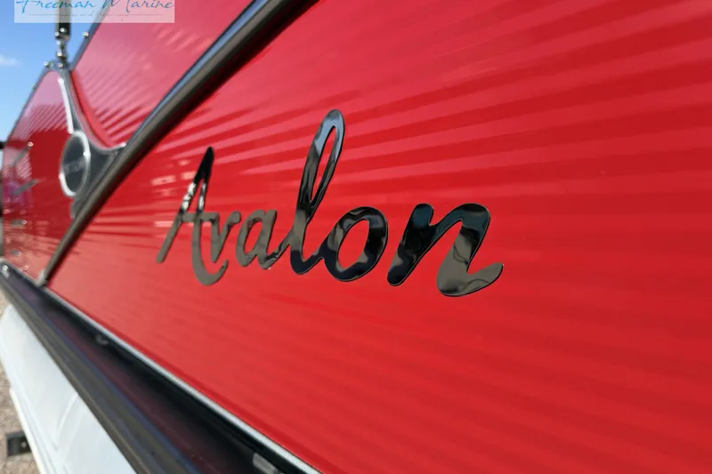Slide: The Image of Red 2019 Avalon Catalina Quad Lounge boat with sleek black logo. - 4