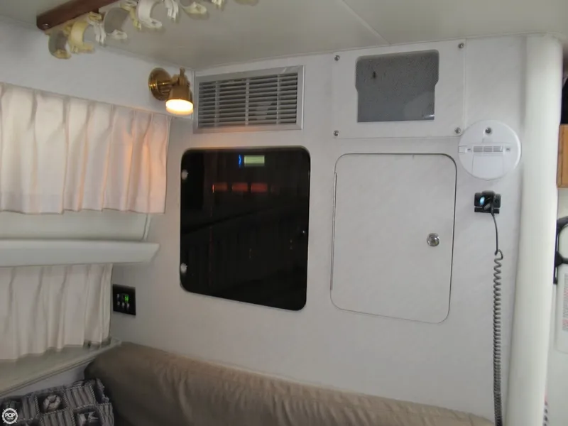Slide: The Image of Wellcraft 3300 Coastal 1991 - 2