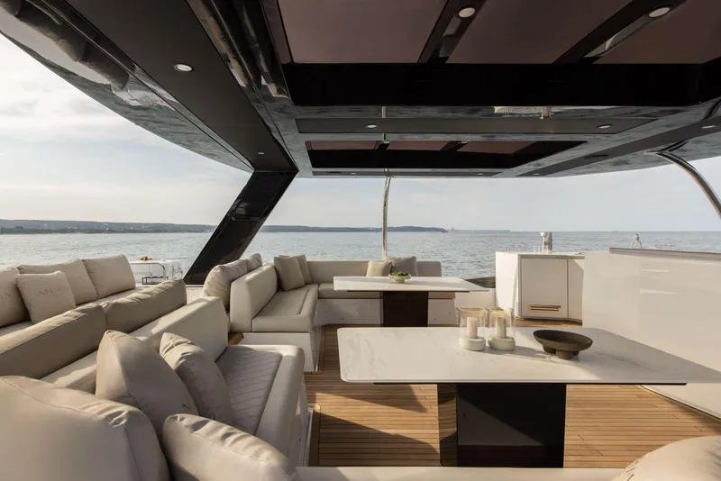 Slide: The Image of Luxurious 2026 Moon Yachts 6ty interior with elegant seating and ocean view. - 13