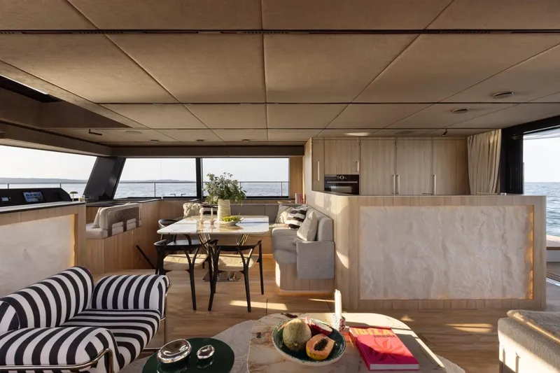 Slide: The Image of Luxurious interior of 2026 Moon Yachts 6ty, featuring modern design and ocean views. - 9