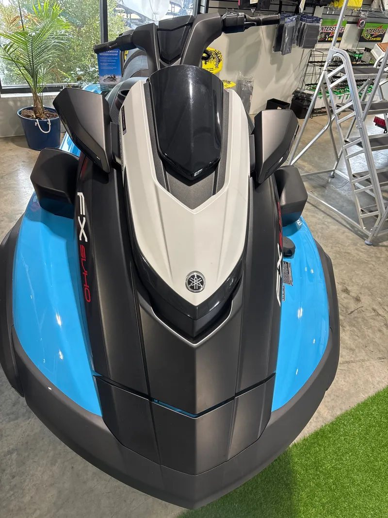 Slide: The Image of 2025 Yamaha WaveRunner FX SVHO in a showroom. - 12