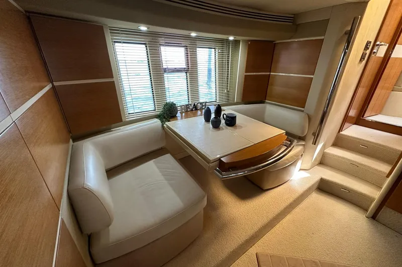 Slide: The Image of Luxurious interior of 2013 Azimut Fly 53 yacht with elegant seating and dining area. - 13