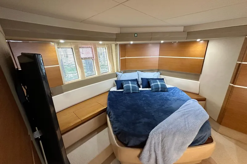 Slide: The Image of Luxurious bedroom interior of 2013 Azimut Fly 53 yacht with cozy bedding and modern design. - 15