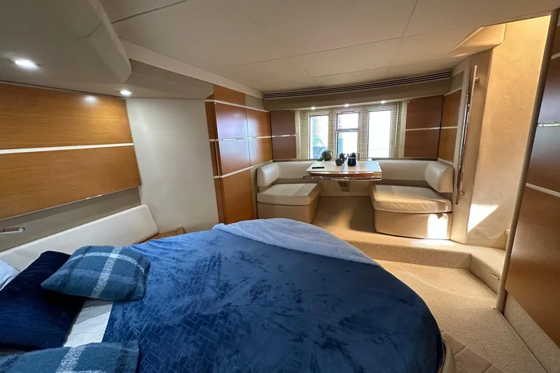 Slide: The Image of Luxurious interior of 2013 Azimut Fly 53 yacht with cozy bedroom and seating area. - 17