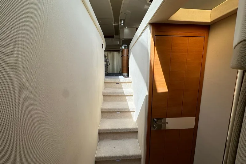 Slide: The Image of Interior stairs and door in 2013 Azimut Fly 53 yacht, featuring modern design. - 22