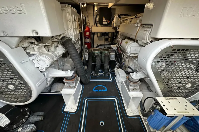 Slide: The Image of Engine room of 2013 Azimut Fly 53 yacht, featuring dual MAN diesel engines. - 26