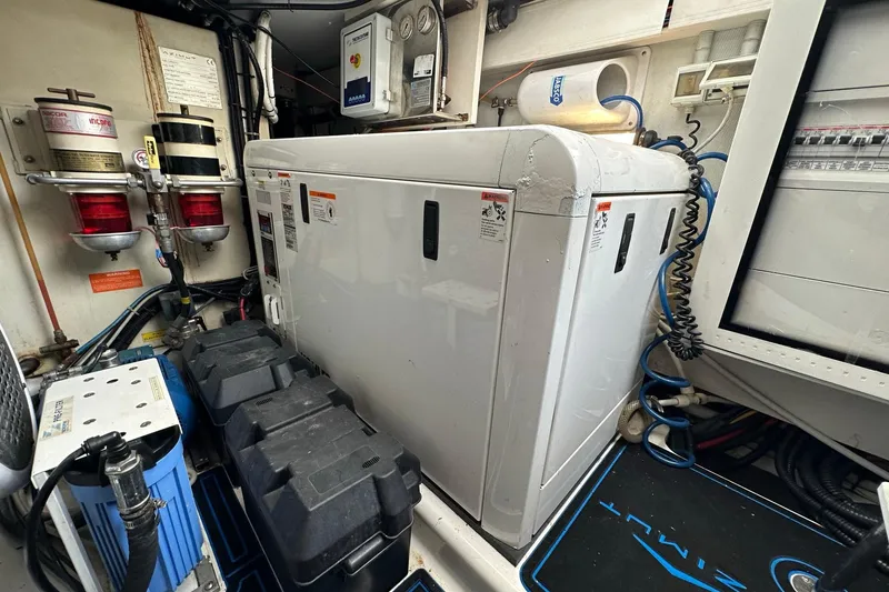 Slide: The Image of Engine room of 2013 Azimut Fly 53 yacht with equipment and control panels. - 29