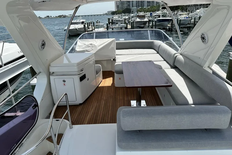 Slide: The Image of Luxurious 2013 Azimut Fly 53 yacht interior with elegant seating and wooden flooring. - 66