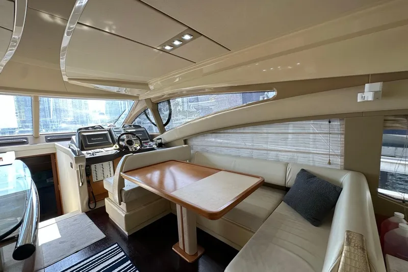 Slide: The Image of Luxurious interior of 2013 Azimut Fly 53 yacht with modern helm and seating area. - 73