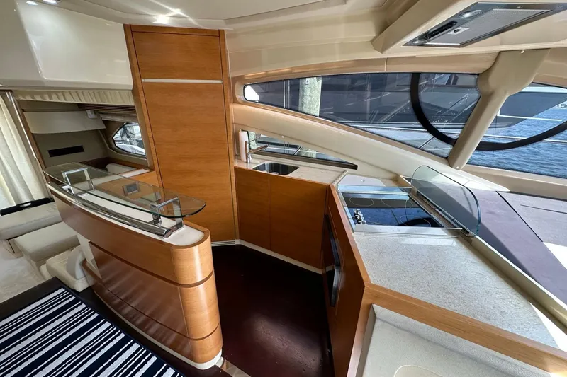 Slide: The Image of Luxurious interior of 2013 Azimut Fly 53 yacht with modern kitchen and elegant wood finishes. - 75