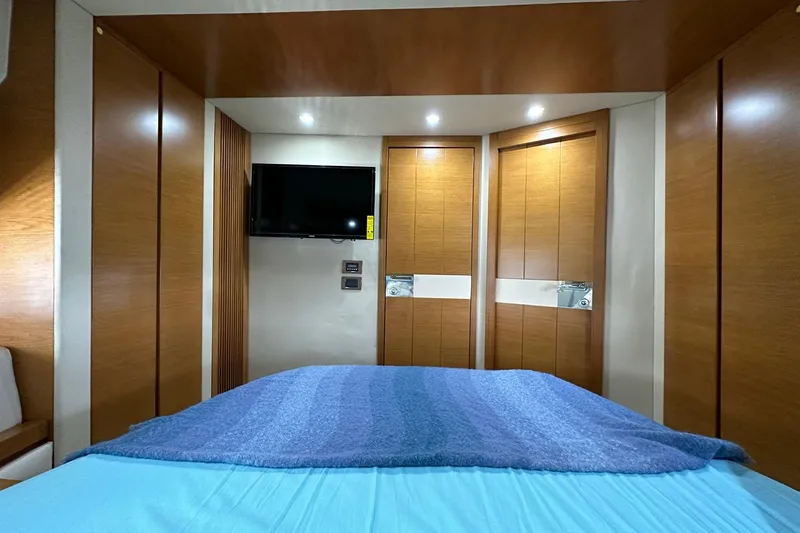 Slide: The Image of Luxurious bedroom interior of 2013 Azimut Fly 53 yacht with modern wood paneling. - 80
