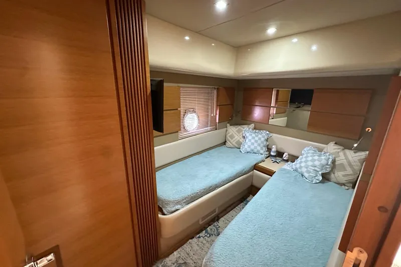 Slide: The Image of Luxurious twin cabin interior of 2013 Azimut Fly 53 yacht with cozy bedding. - 82
