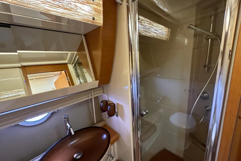 Slide: The Image of Luxurious bathroom in 2013 Azimut Fly 53 yacht with modern fixtures and shower. - 88