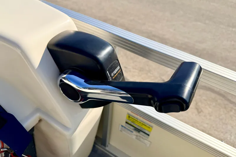 Slide: The Image of Close-up of a 2005 Bennington 205L boat throttle control handle. - 43
