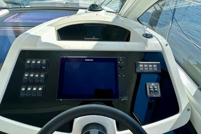 Slide: The Image of Control panel of 2012 Beneteau Gran Turismo 34 yacht with navigation system. - 19