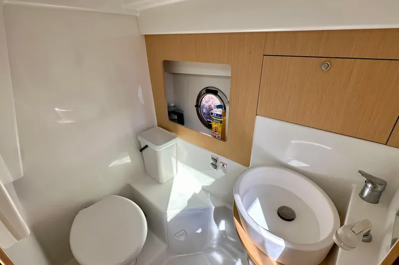 Slide: The Image of 2012 Beneteau Gran Turismo 34 bathroom with modern fixtures and wooden accents. - 32