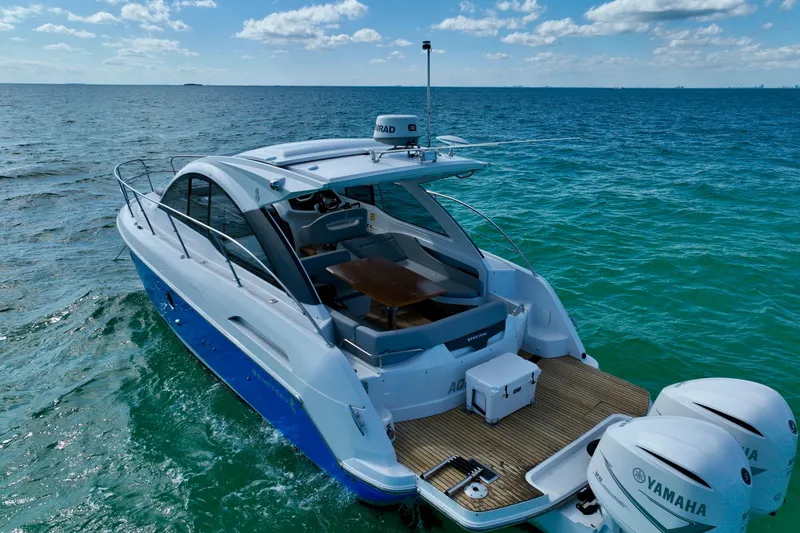 Slide: The Image of 2012 Beneteau Gran Turismo 34 yacht on open sea with Yamaha engines. - 7