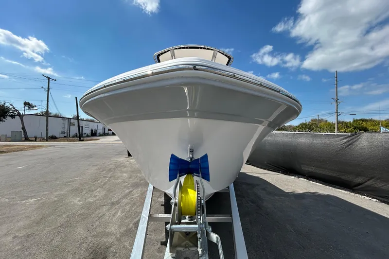 Slide: The Image of 2022 Sea Fox 206 Commander boat on trailer under blue sky. - 11