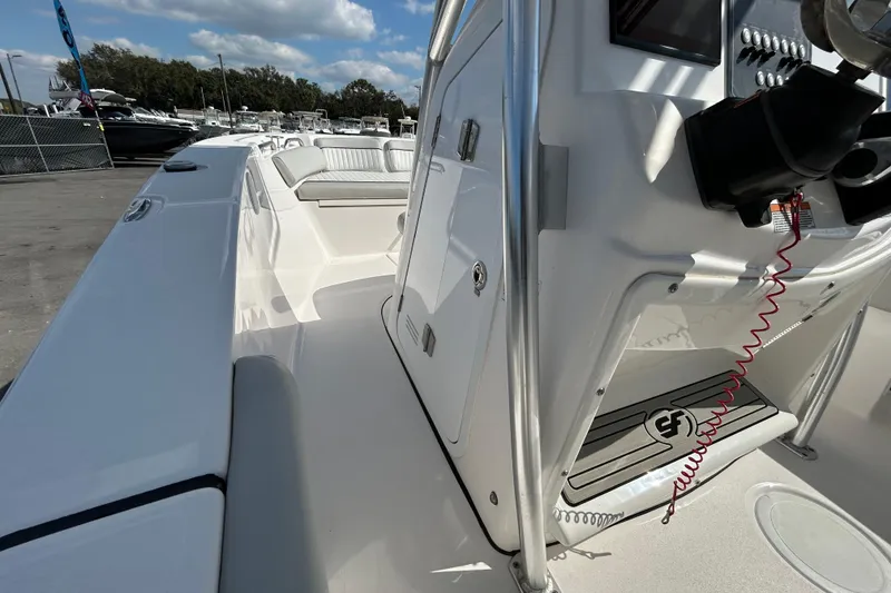 Slide: The Image of 2022 Sea Fox 206 Commander boat interior with seating and control panel. - 19
